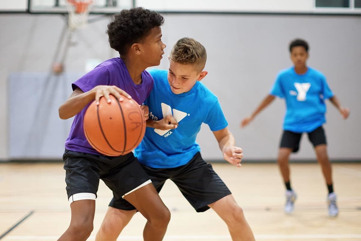 Boys playing basketball